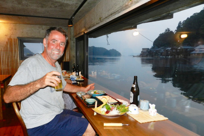 A photo of Kirk in a boat house restaurant