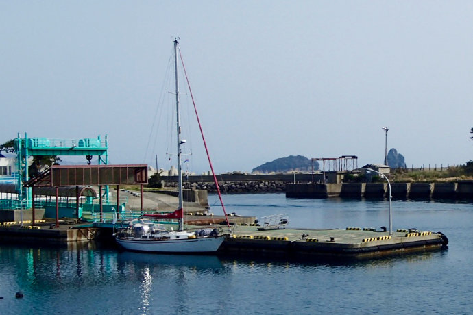 A photo of Silk Purse moored at a ferry dock at Ikejima, Nagasaki
