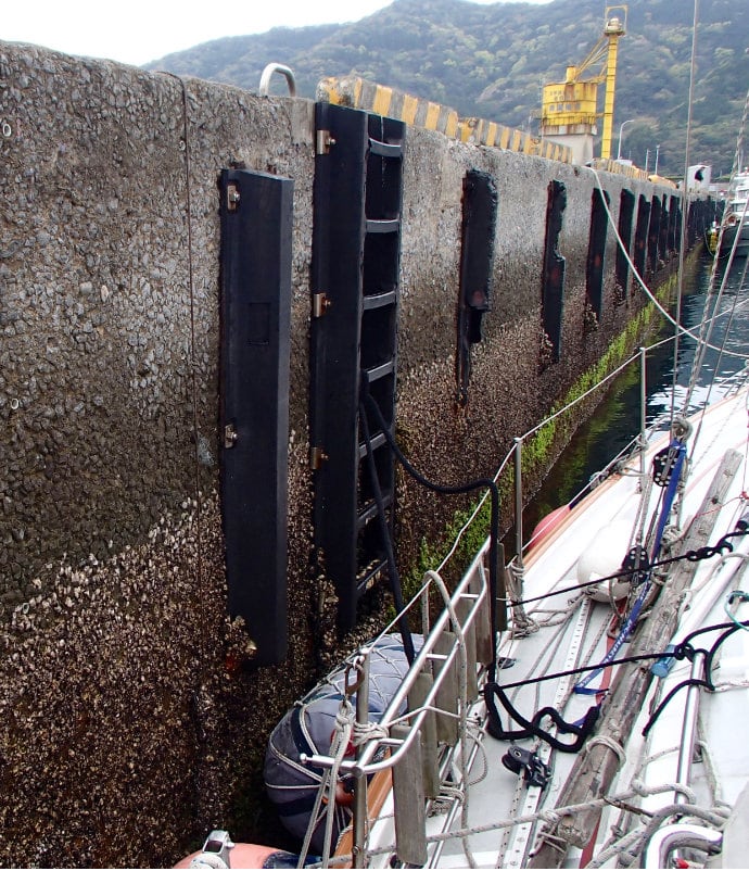 Fenders and ladder on wall